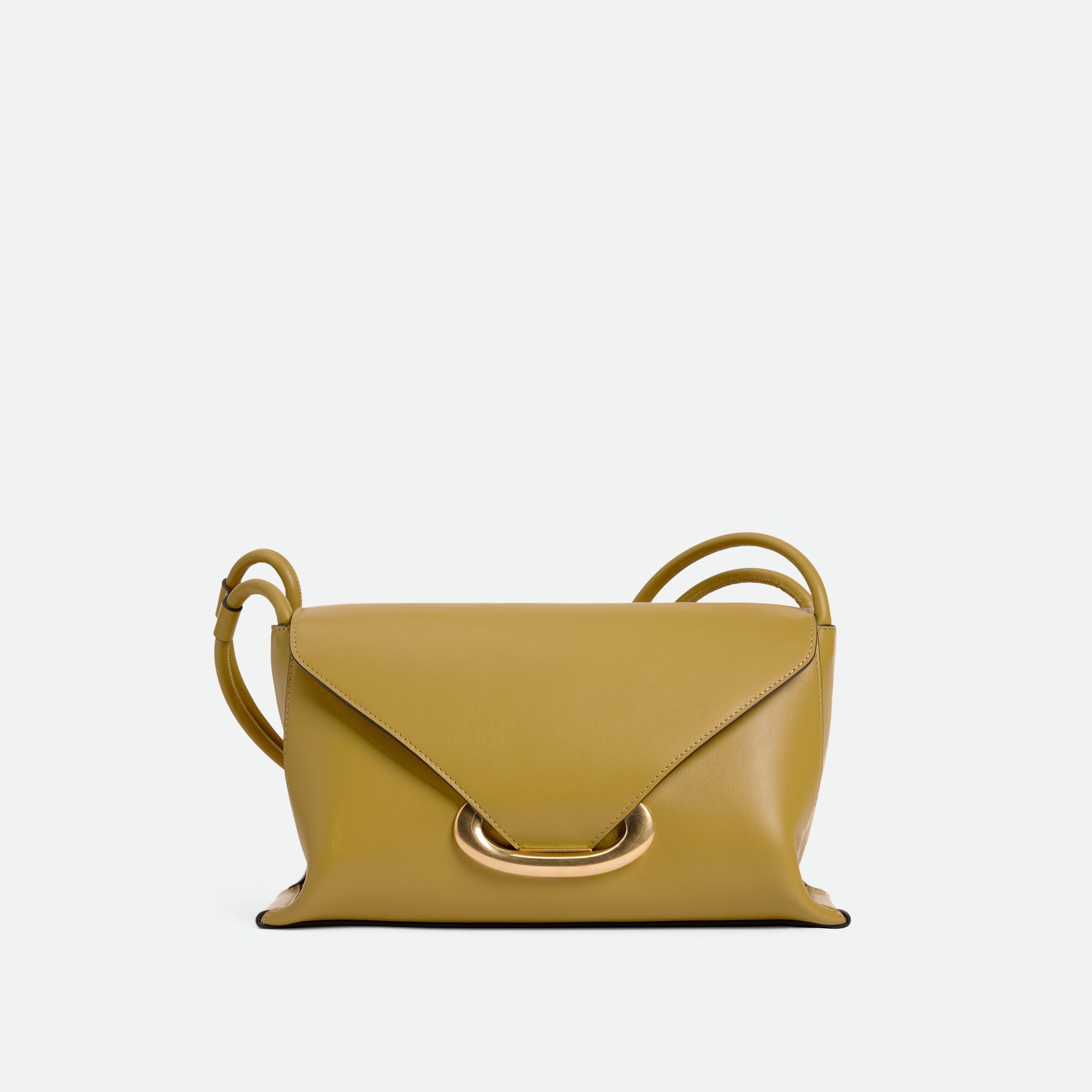 Wandler Veneto Shoulder Bag in the color Saffron, yellow, Italian calf leather with oversized golden clasp hardware and structured silhouette, front view.