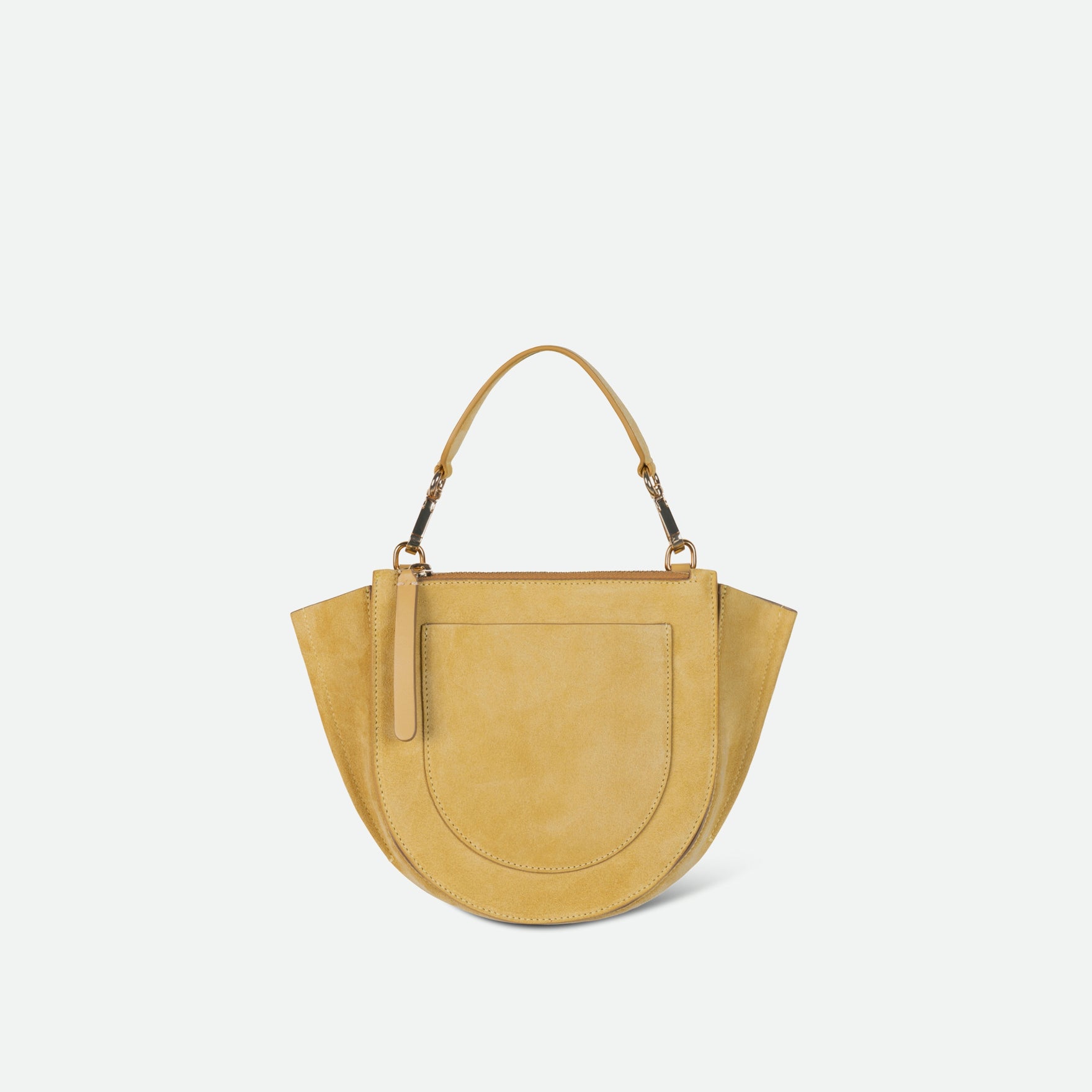 Wandler Hortensia Bag Mini in the color Sandy Suede, muted yellow suede, Italian calf leather with golden hardware, rounded silhouette and top handle, backside view. 