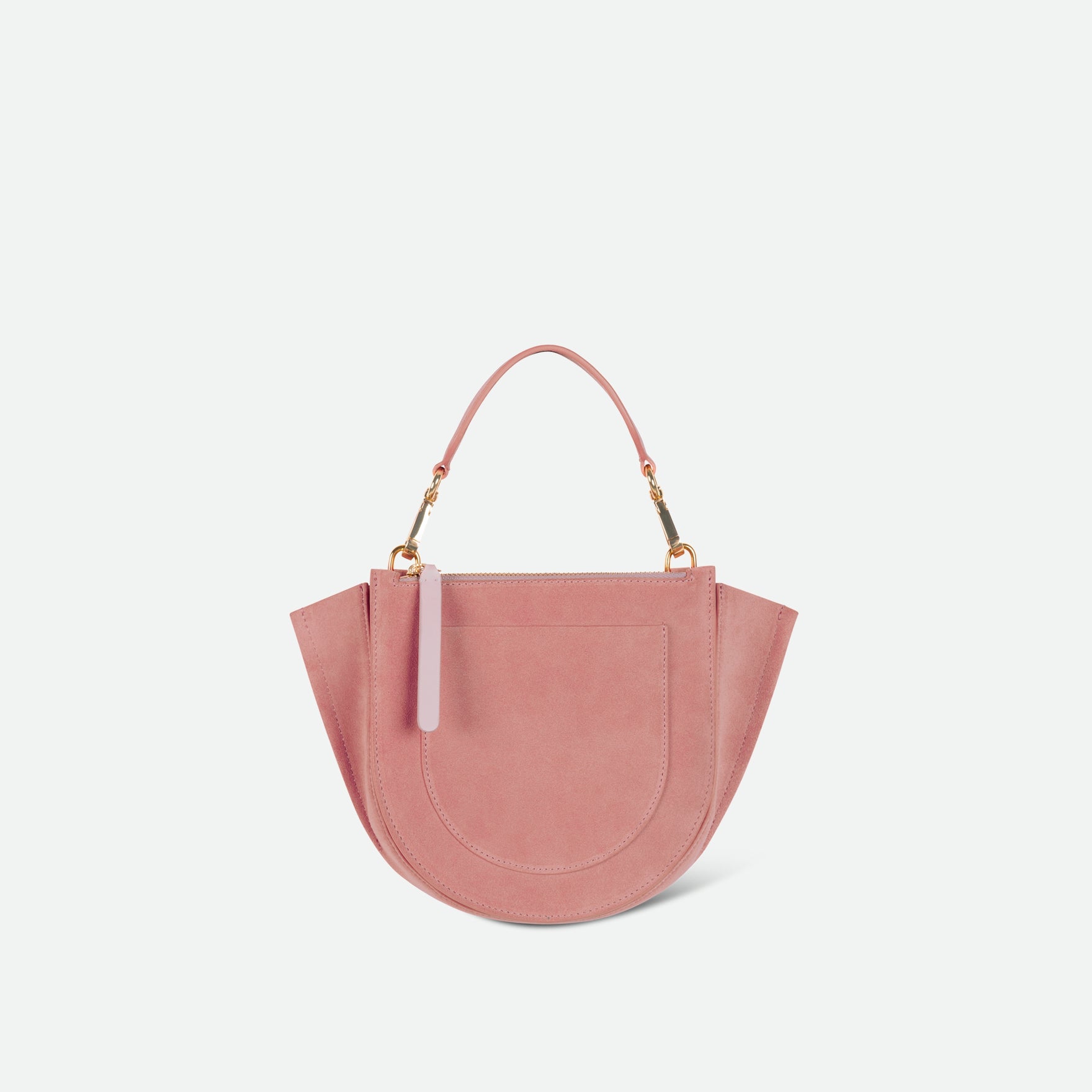 Wandler Hortensia Bag Mini in the color Apricot Suede, light pink suede, Italian calf leather with golden hardware, rounded silhouette and top handle, backside view. 
