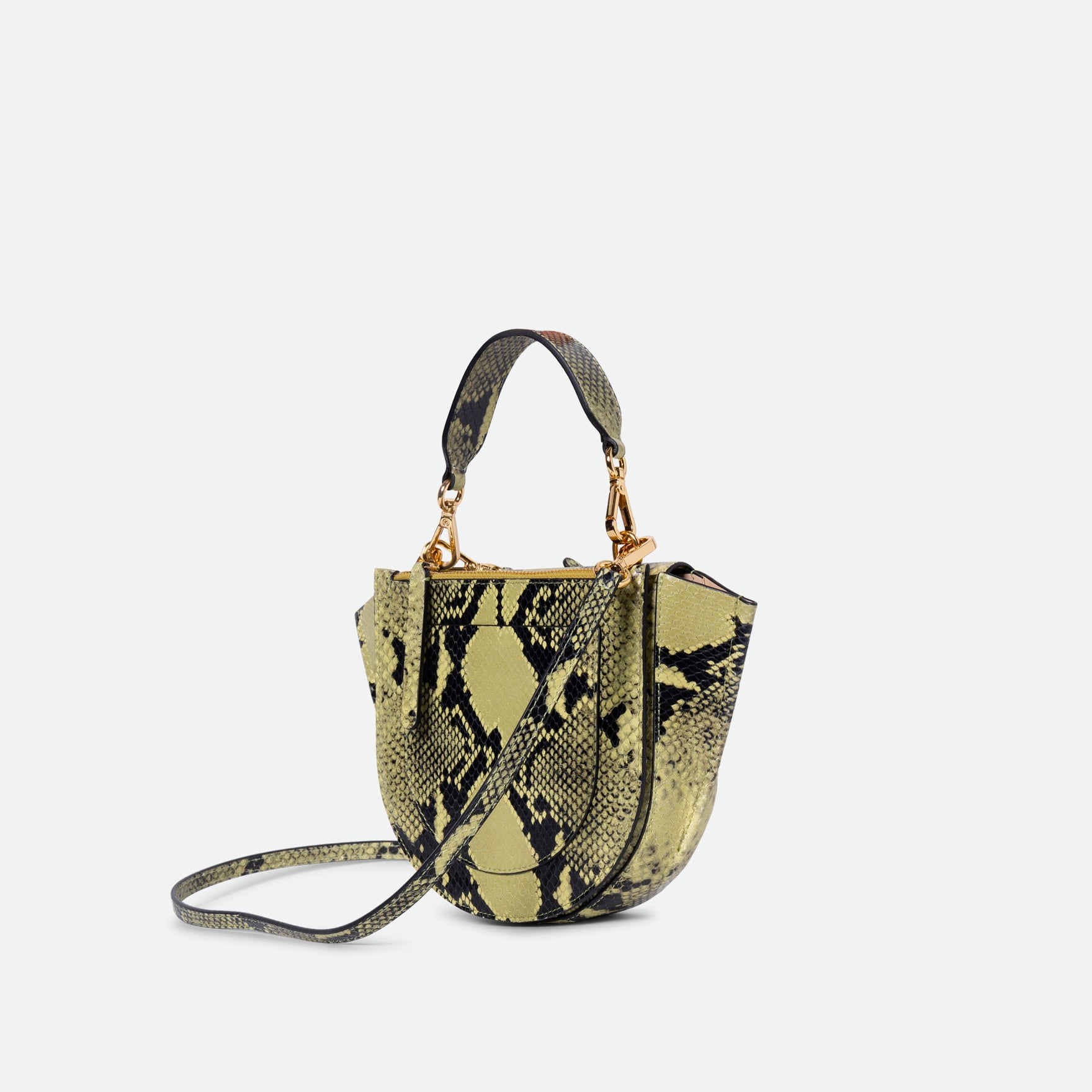 Wandler Hortensia Bag Mini in the color Lime Python, green python print, Italian calf leather with golden hardware, rounded silhouette and top handle, three quarters backside view.