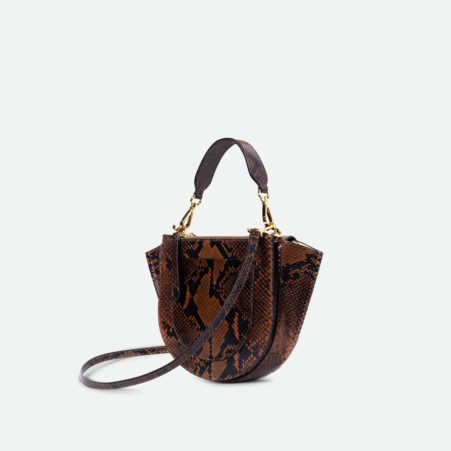 Wandler Hortensia Bag Mini in the color Brown Python, Italian calf leather with golden hardware, rounded silhouette and top handle, three quarters angle, backside view.