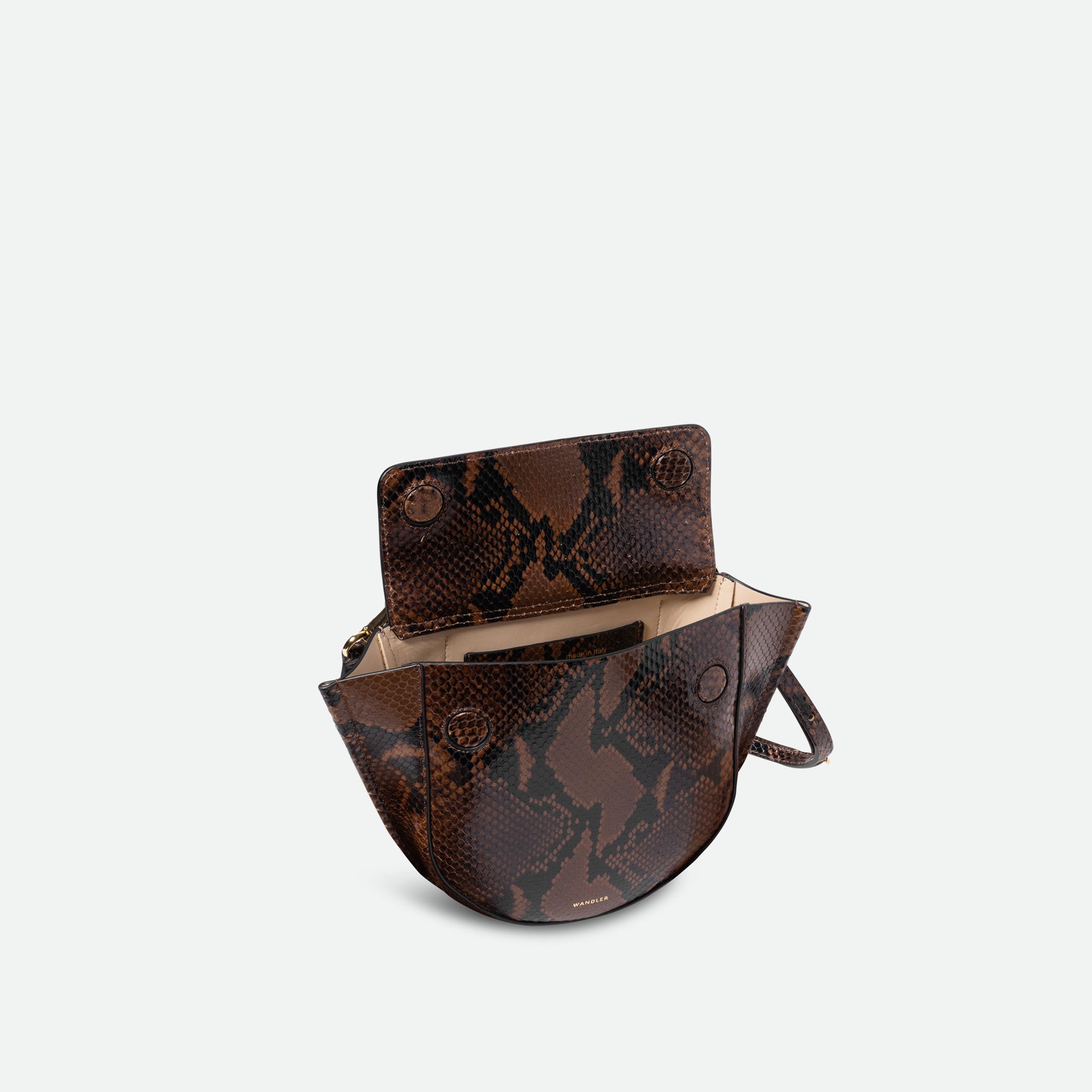 Wandler Hortensia Bag Mini in the color Brown Python, Italian calf leather with golden hardware, rounded silhouette and top handle. The bag is pictured from the front with the flap open, giving a slight view of the inside of the bag.