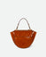 Wandler Hortensia Bag Mini in the color Cognac Eyelets, caramel brown, Italian calf leather with golden hardware, rounded silhouette and top handle, front view.