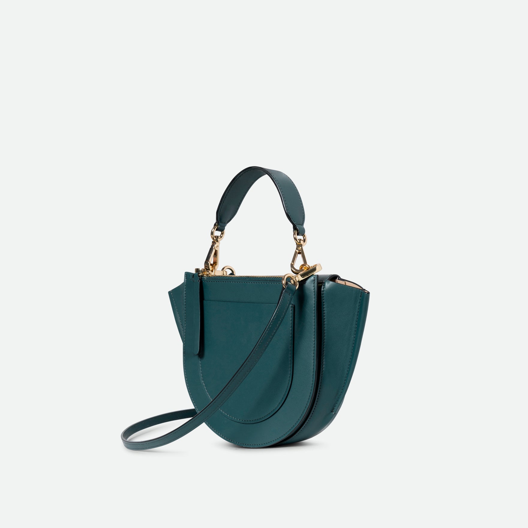 Wandler Hortensia Bag Mini in the color Teal, made from Italian calf leather with golden hardware, rounded silhouette and top handle, backside view.
