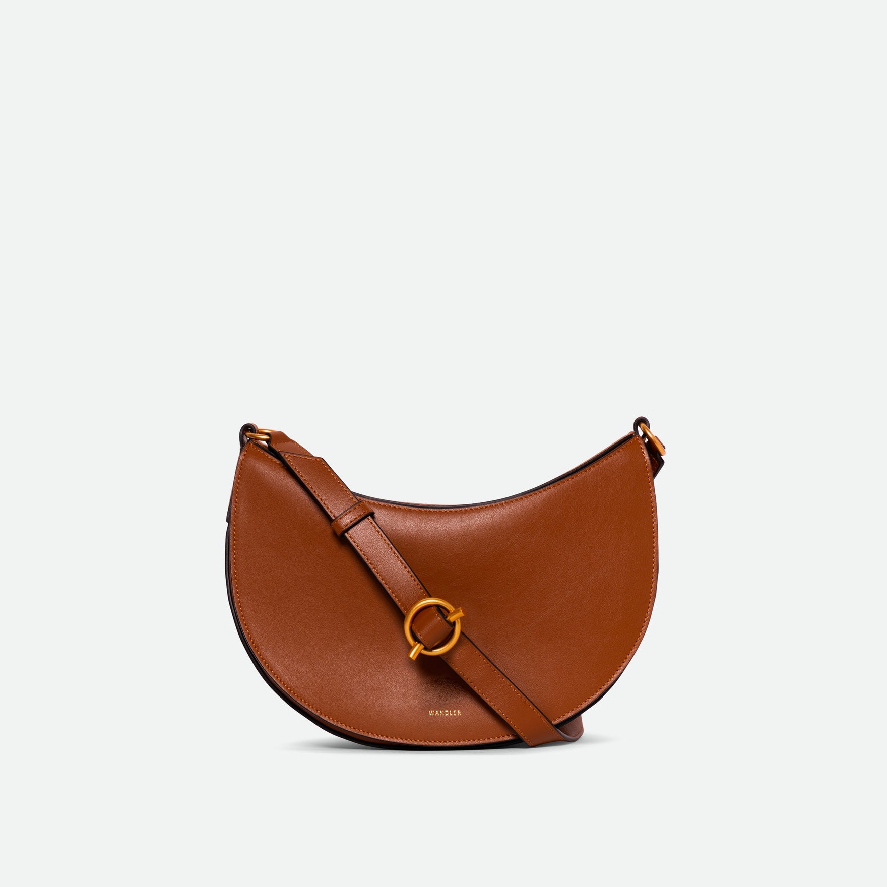 Wandler Kate Bag Big in the color Saddle, made from Italian calf leather with golden hardware and adjustable shoulder strap, front view.