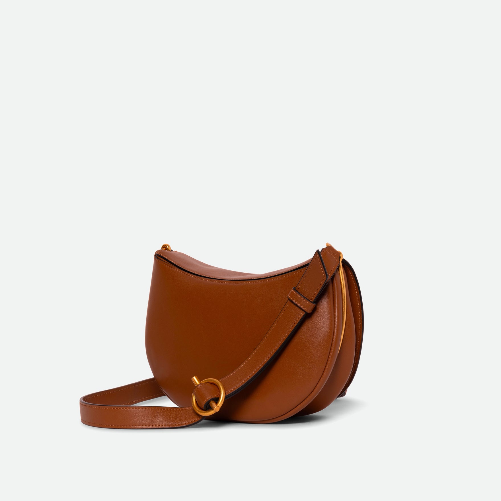 Wandler Kate Bag Big in the color Saddle, made from Italian calf leather with golden hardware and adjustable shoulder strap, backside view.