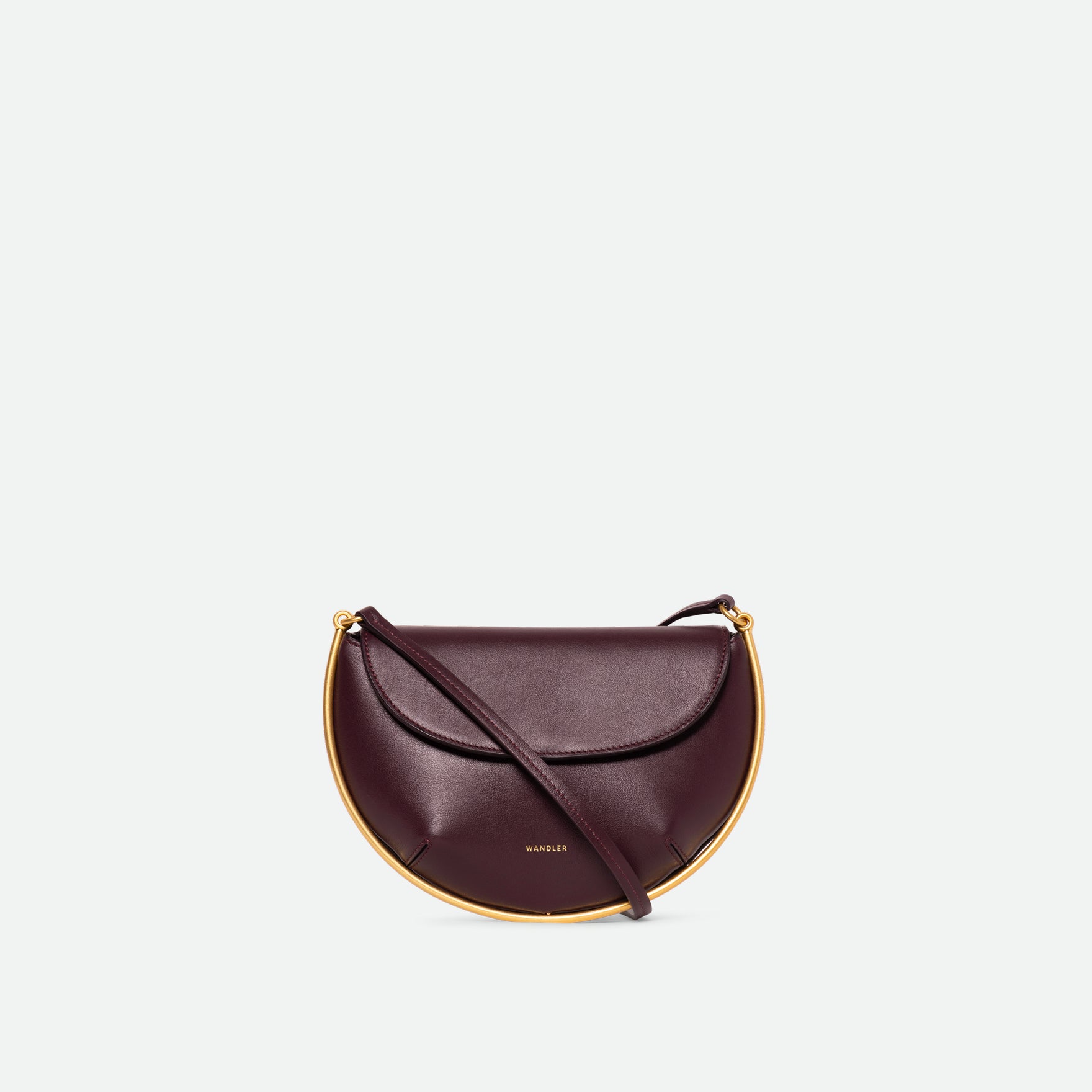 Wandler Kate Mini Crossbody in the color Grape, made from Italian calf leather with golden hardware and adjustable strap, front view.