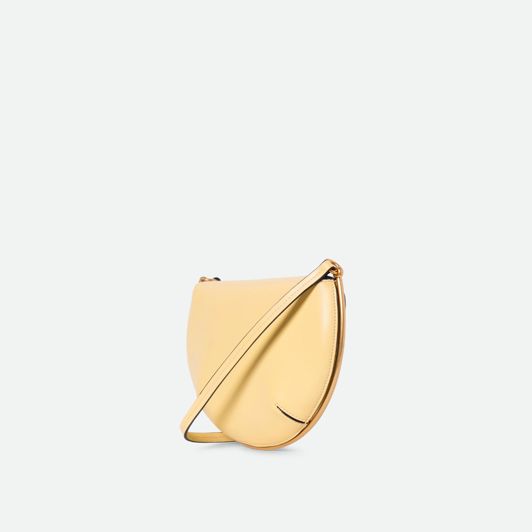 Wandler Kate Mini Crossbody in Helio Italian calf leather with golden hardware and adjustable strap, backside view.
