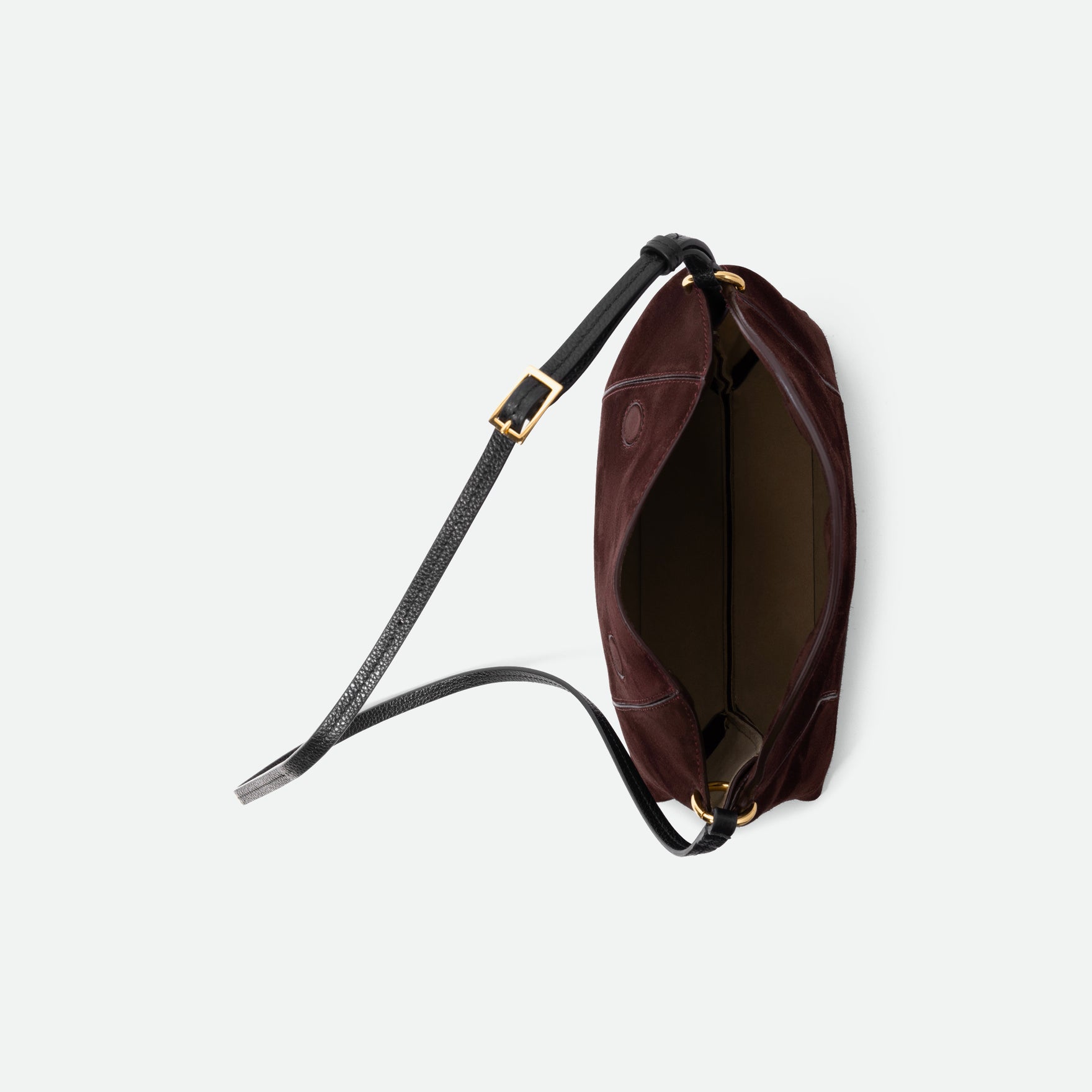 Wandler Penelope Slouch Bag in the color Acai Suede made from calf leather with golden hardware and adjustable slim strap, topside view.