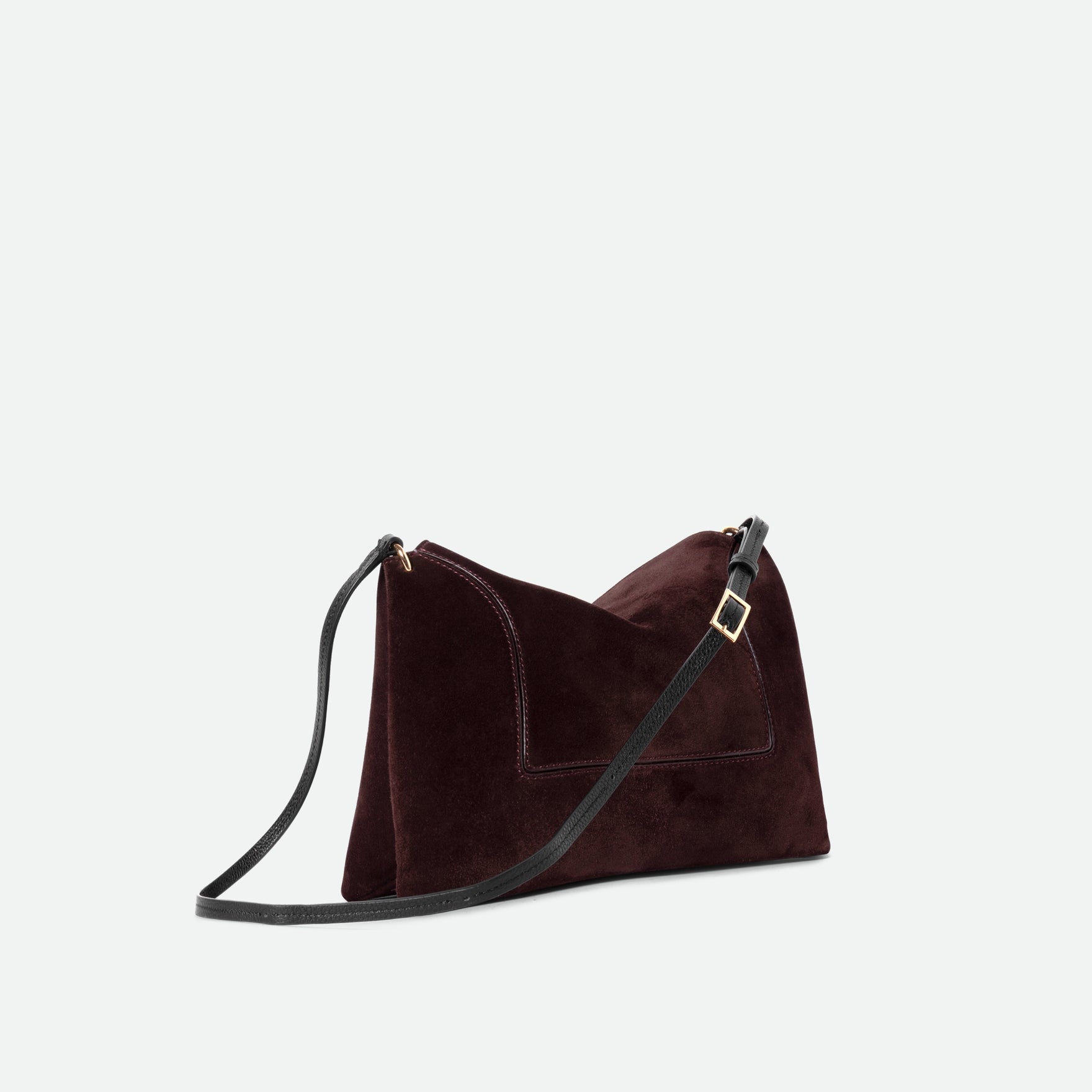 Wandler Penelope Slouch Bag in the color Acai Suede made from calf leather with golden hardware and adjustable slim strap, three quarters view.