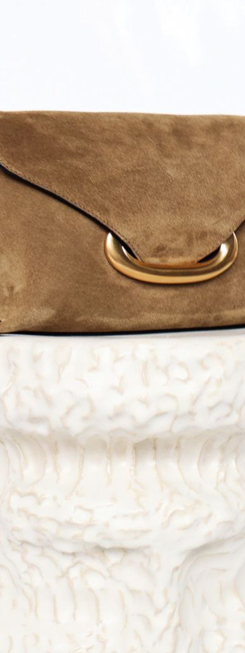 Wandler Veneto Shoulder Bag Small in the color Tabacco Suede, made from Italian calf leather with oversized golden clasp hardware, structured silhouette, three quarters view.