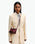 Wandler Penelope Slouch Mini in the color Acai, made from  Italian calf leather with golden hardware and slim adjustable strap, front view.
